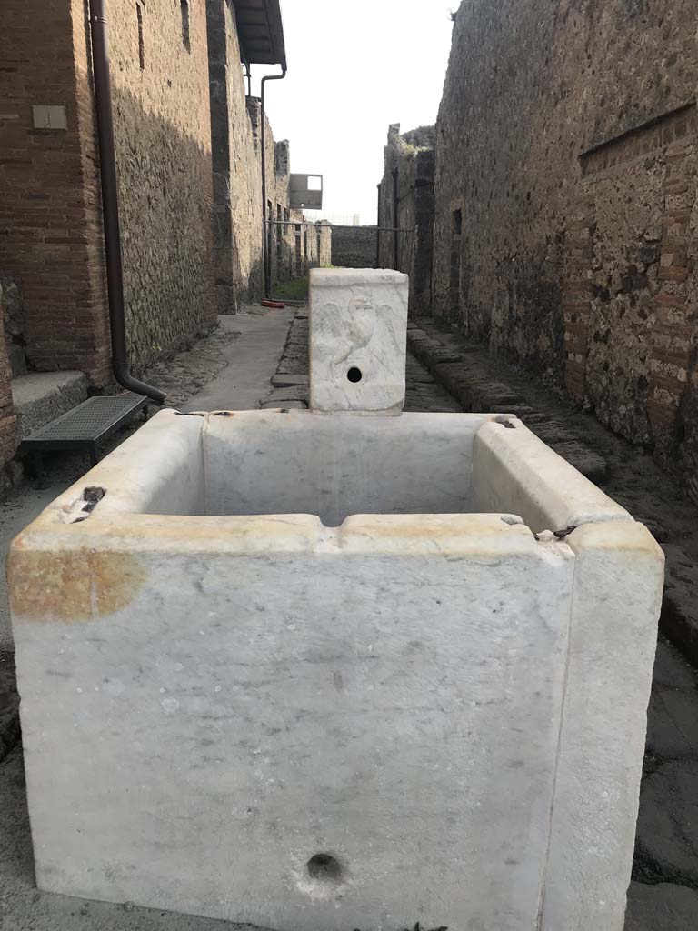 VII.15.1 Pompeii. April 2019. Looking east towards fountain in Vicolo del Gallo.
Photo courtesy of Rick Bauer.
