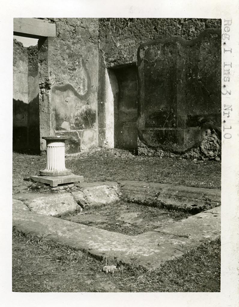 I.2.10 Pompeii but shown as I.3.10 on photo. 1937-39. 
Looking towards the south-east corner of the atrium with recess/cupboard and painted decoration on wall.
Photo courtesy of American Academy in Rome, Photographic Archive. Warsher collection no. 1809.

