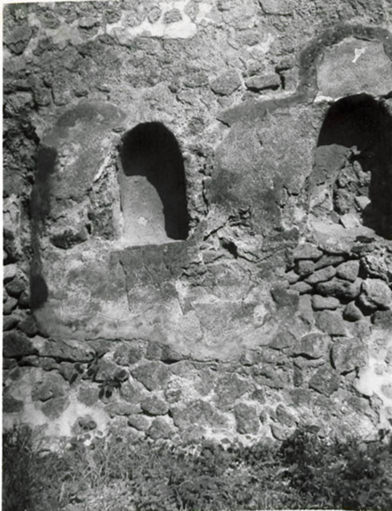 I.3.8b Pompeii. 1935 photograph taken by Tatiana Warscher described as  Two niches for the household gods, from a rear room.
See Warscher, T, 1935: Codex Topographicus Pompejanus, Regio I, 3: (no.25a), Rome, DAIR, whose copyright it remains.  
