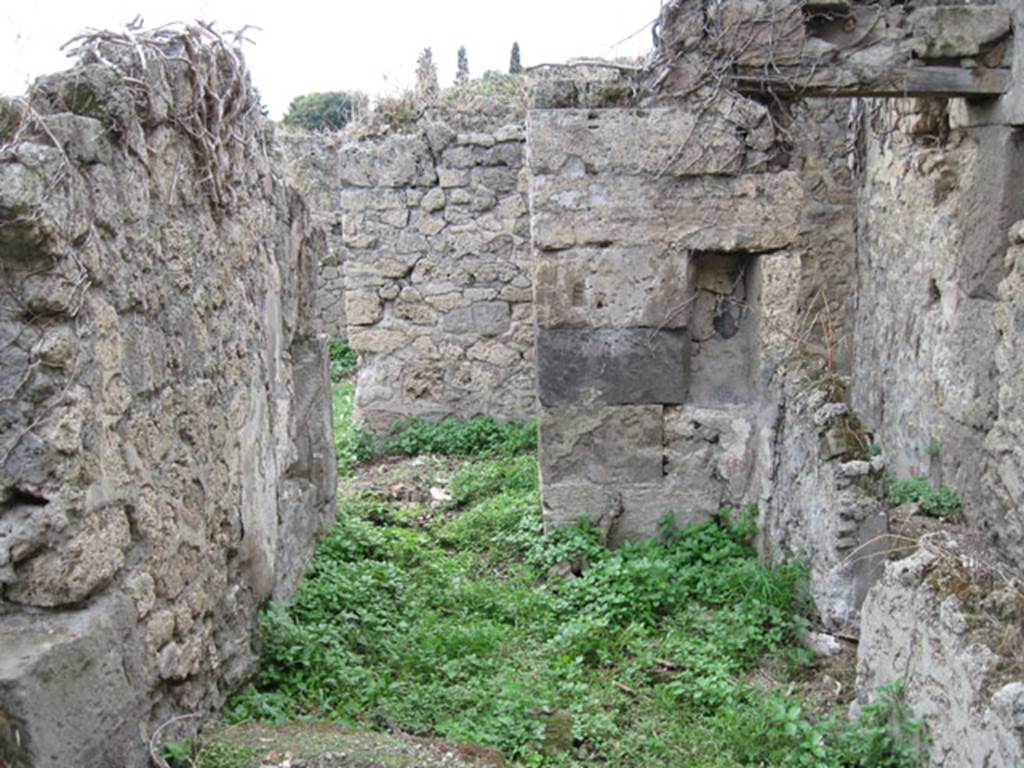 I.3.29 Pompeii. September 2010.  Looking towards west wall of small room 3, on south side of small corridor or steps to upper floor.  An opening in the north wall, on the right of the photo, would have led to area which would have been below the stairs. Photo courtesy of Drew Baker.
