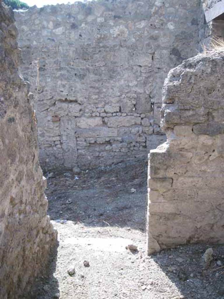 I.5.1 Pompeii. September 2010. Doorway from first room, looking west into entrance room. Photo courtesy of Drew Baker.
