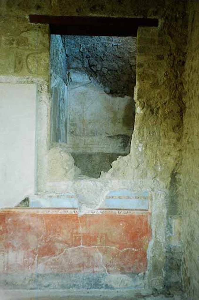 I.6.11 Pompeii. June 2010. East wall of atrium, looking into ala in south-east corner of atrium. During the last years of its existence, the ala was bricked up without access. Photo courtesy of Rick Bauer.
