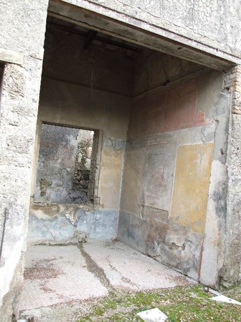 I.7.19 Pompeii. December 2006. Looking south-east into tablinum with window in east wall to a small garden area.