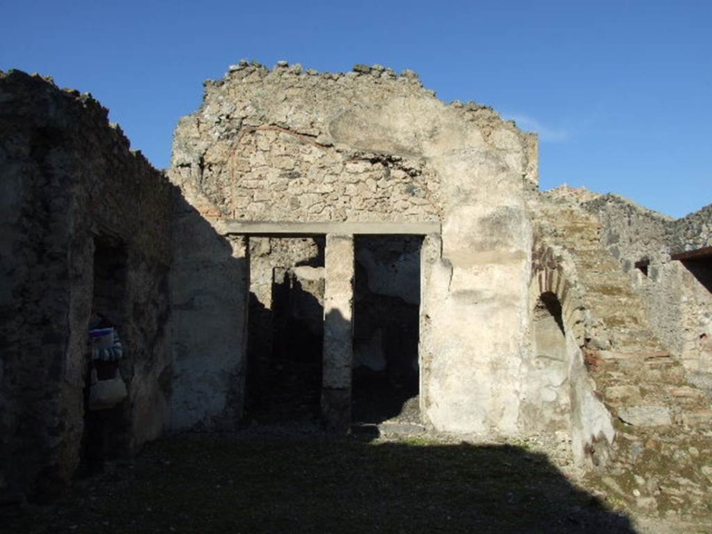 I.9.10 Pompeii. December 2006. North side of atrium withdoorways to cubiculum, on left, and oecus, on right. See Eschebach, L., 1993. Gebudeverzeichnis und Stadtplan der antiken Stadt Pompeji. Kln: Bhlau. (p.50)
