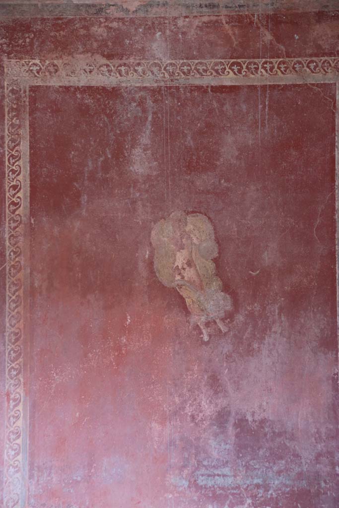 I.10.4 Pompeii. September 2021. 
Room 15, painted flying figure from centre of south panel on east wall. Photo courtesy of Klaus Heese.
