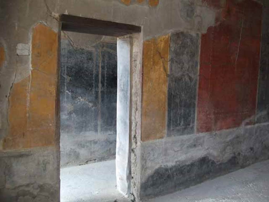 I.10.4 Pompeii. May 2010. Room 12, doorway to corridor 9 in west wall. 