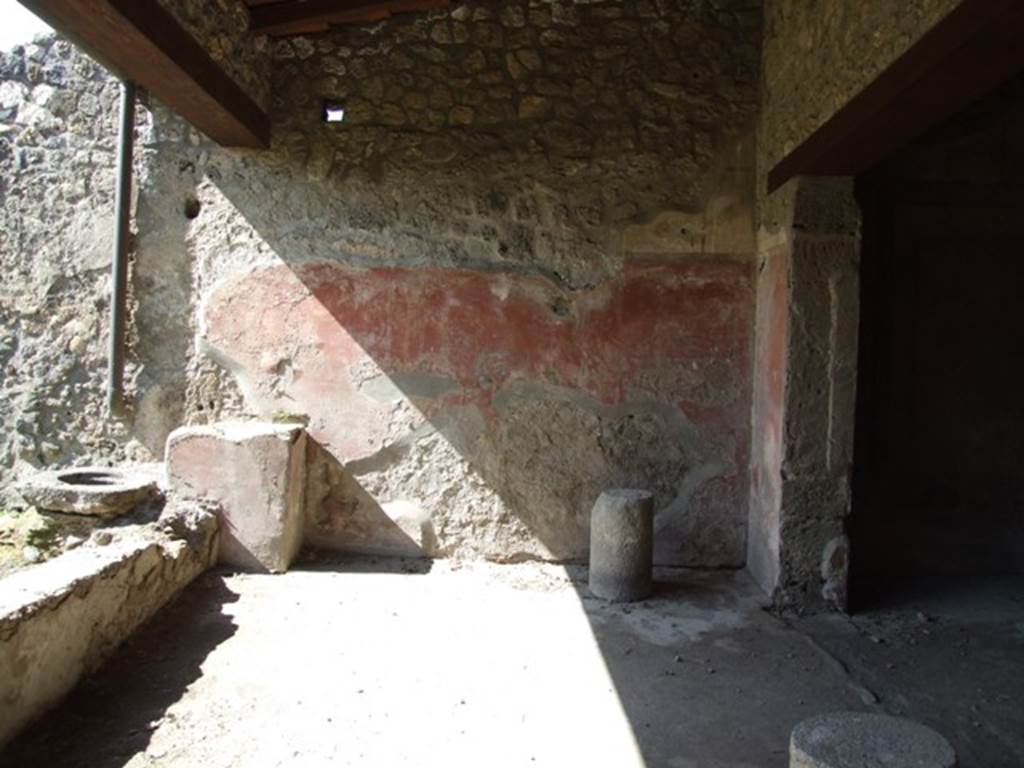 I.12.2 and I.12.1 Pompeii.  March 2009.  Room 8.  Portico.  West wall.