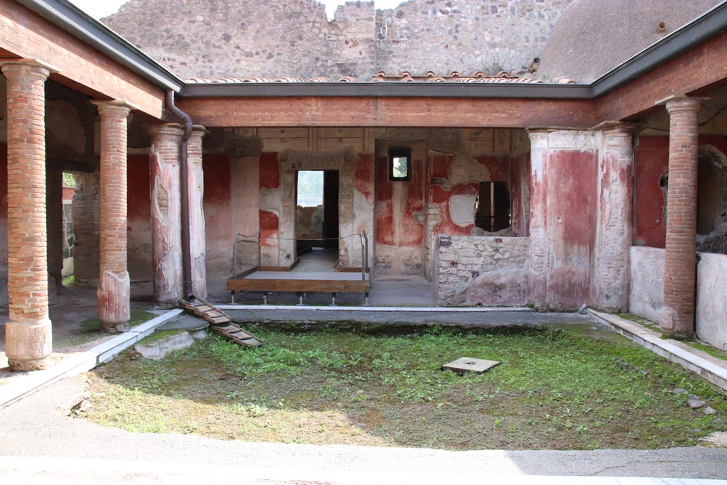 II.4.6 Pompeii. October 2022. Looking south across portico from entrance doorway. Photo courtesy of Klaus Heese.