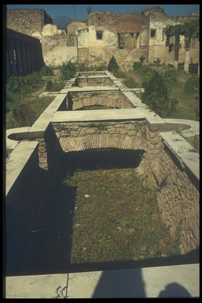 II.4.6 Pompeii.  Euripus, or water feature, looking north.
Photographed 1970-79 by Günther Einhorn, picture courtesy of his son Ralf Einhorn.
