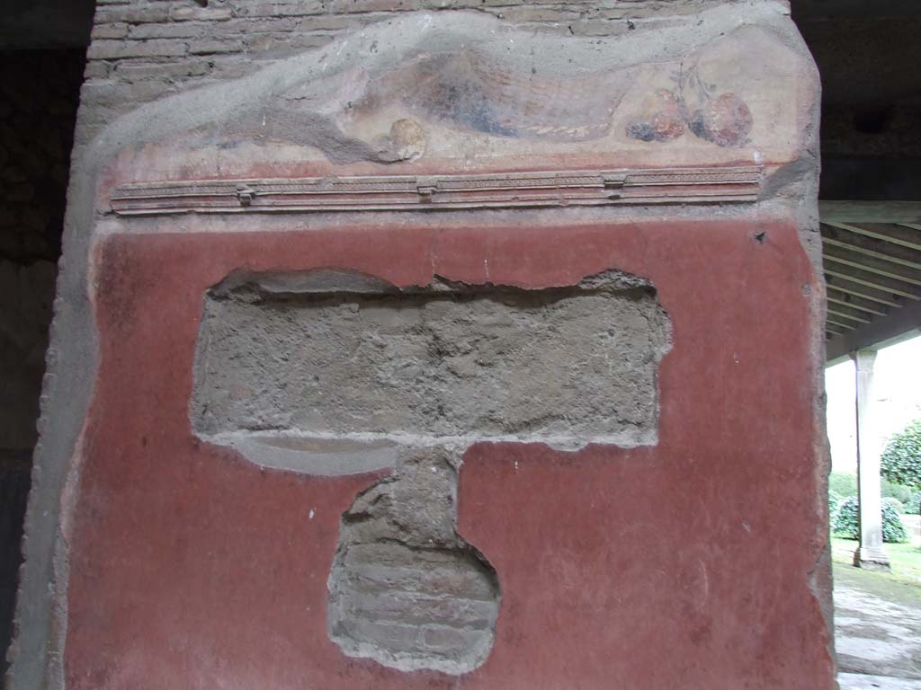II.4.10 Pompeii. December 2006. Atrium, north side, painted plaster detail.