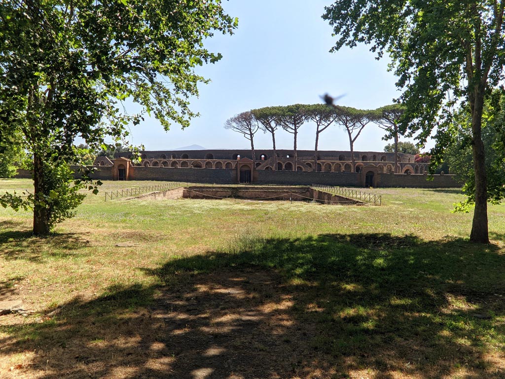 II.7. Pompeii. April 2022. Looking east across palaestra towards area of swimming pool. Photo courtesy of Giuseppe Ciaramella.