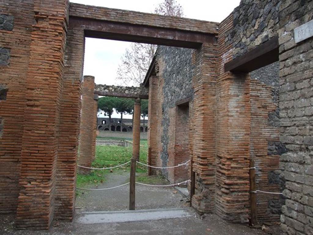 II.7.9 Pompeii. Palaestra. December 2006. Entrance doorway looking east from vicolo.