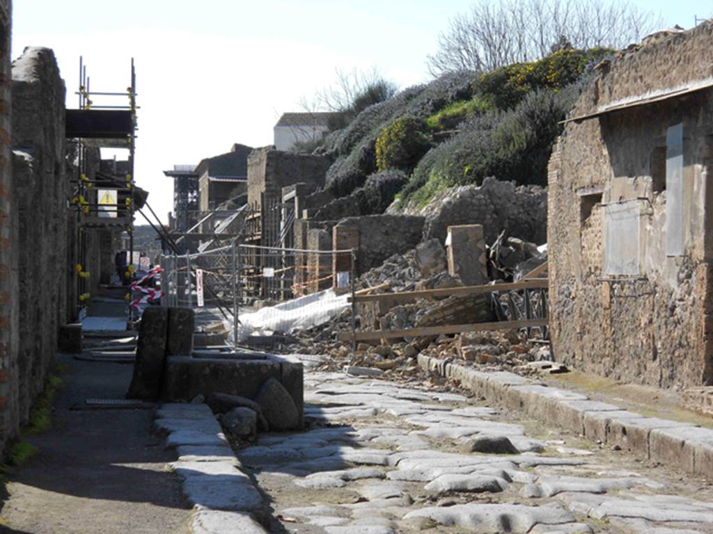 III.3.6 Pompeii. February 2011, looking west along Via dellAbbondanza to III.4.1 and III.3.6. Photo courtesy of Guy de la Bedoyere.