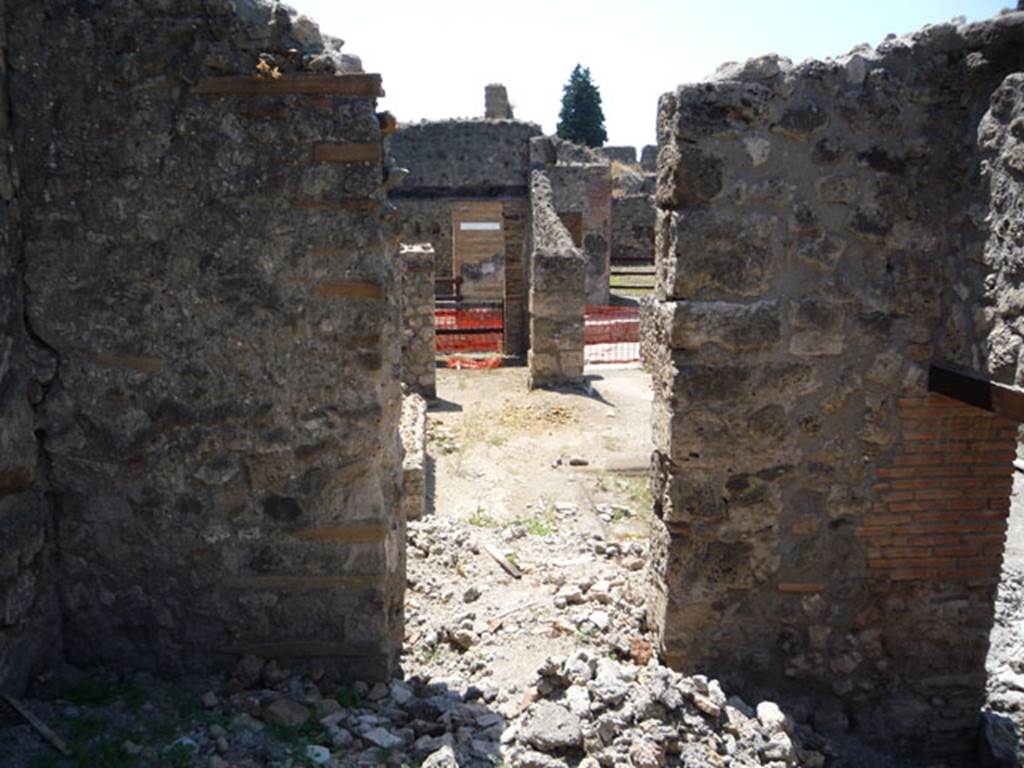 V.1.15 Pompeii. July 2008. Looking towards west wall, and doorway into atrium, in centre. Photo courtesy of Jared Benton.