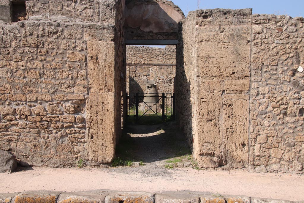 V.3.8 Pompeii. October 2023. Looking north to entrance doorway. Photo courtesy of Klaus Heese.