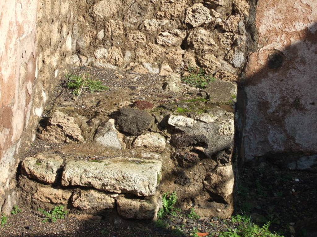 VI.3.6 Pompeii. December 2005. Steps to upper floor in north-east corner of shop. According to Eschebach and Hobson, there may have been a latrine nearby. See Eschebach, L., 1993. Gebudeverzeichnis und Stadtplan der antiken Stadt Pompeji. Kln: Bhlau. (p.163) See Hobson, B. 2009. Pompeii, Latrines and Down Pipes. Oxford, Hadrian Books, (p.196)
