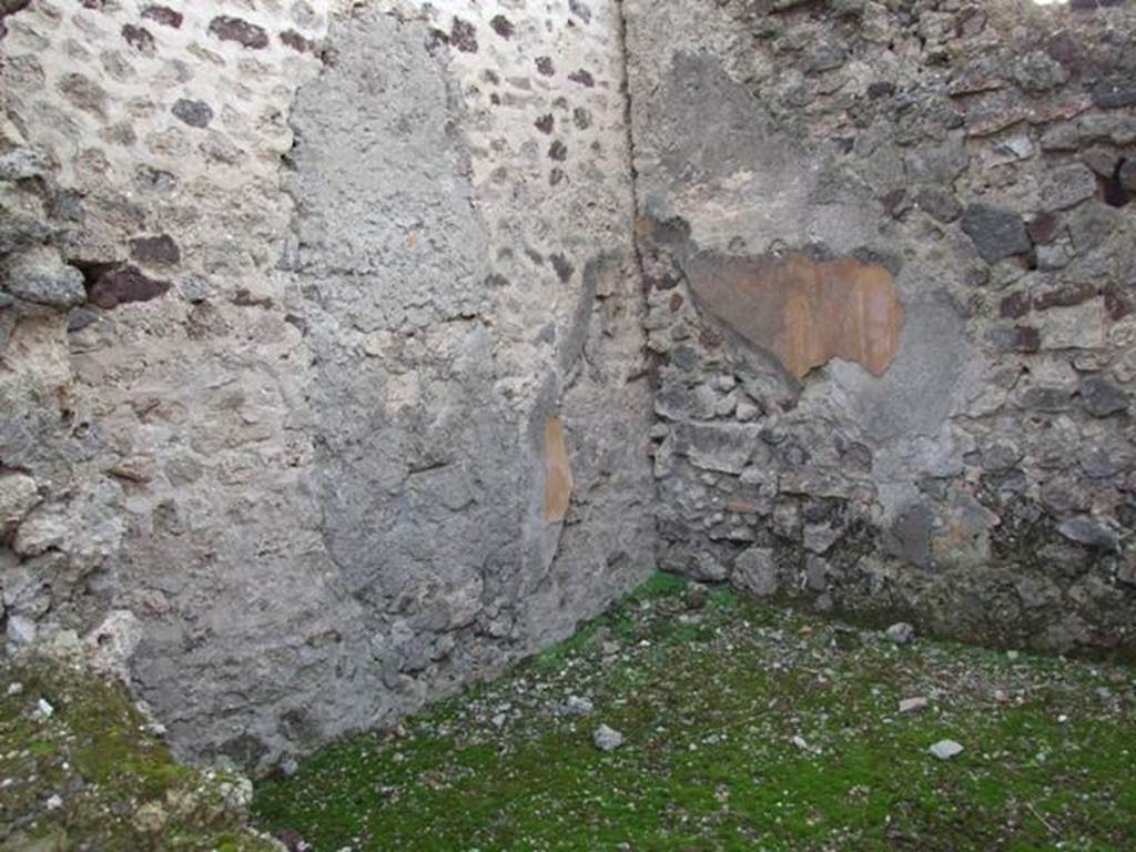 VI.9.1 Pompeii. December 2007. Room 17, looking towards south-west corner.
According to Packer, in room 17 (his room 10), the walls were decorated with yellow panels which were separated by green and white borders. The border on the west wall was painted as a hanging garland while the others were as a strip of filigree work. 
