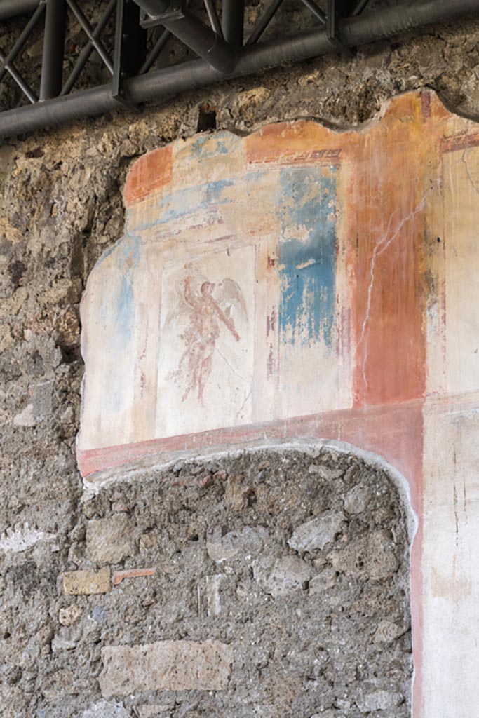 VI.9.6 Pompeii. January 2023. 
Room 9, south wall of tablinum with painting of floating figure. Photo courtesy of Johannes Eber.
