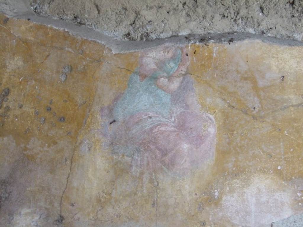 VI.9.6 Pompeii. March 2009. Room 6, wall painting of a sitting girl in green chiton and red mantel. From the south end of the west wall of the peristyle. 
See Helbig, W., 1868. Wandgemälde der vom Vesuv verschütteten Städte Campaniens. Leipzig: Breitkopf und Härtel. (1886: p.438).

