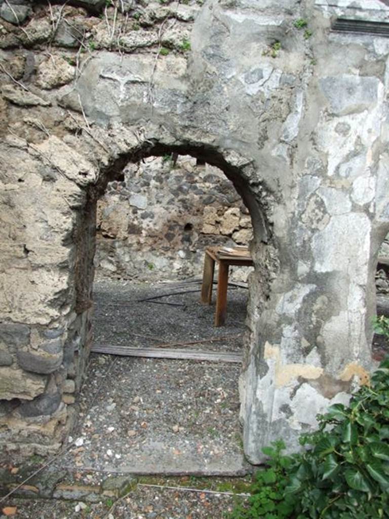VI.10.7 Pompeii.  March 2009.  Room 15.  Garden area.  North side.  Arched door at west end leading to rear of house.