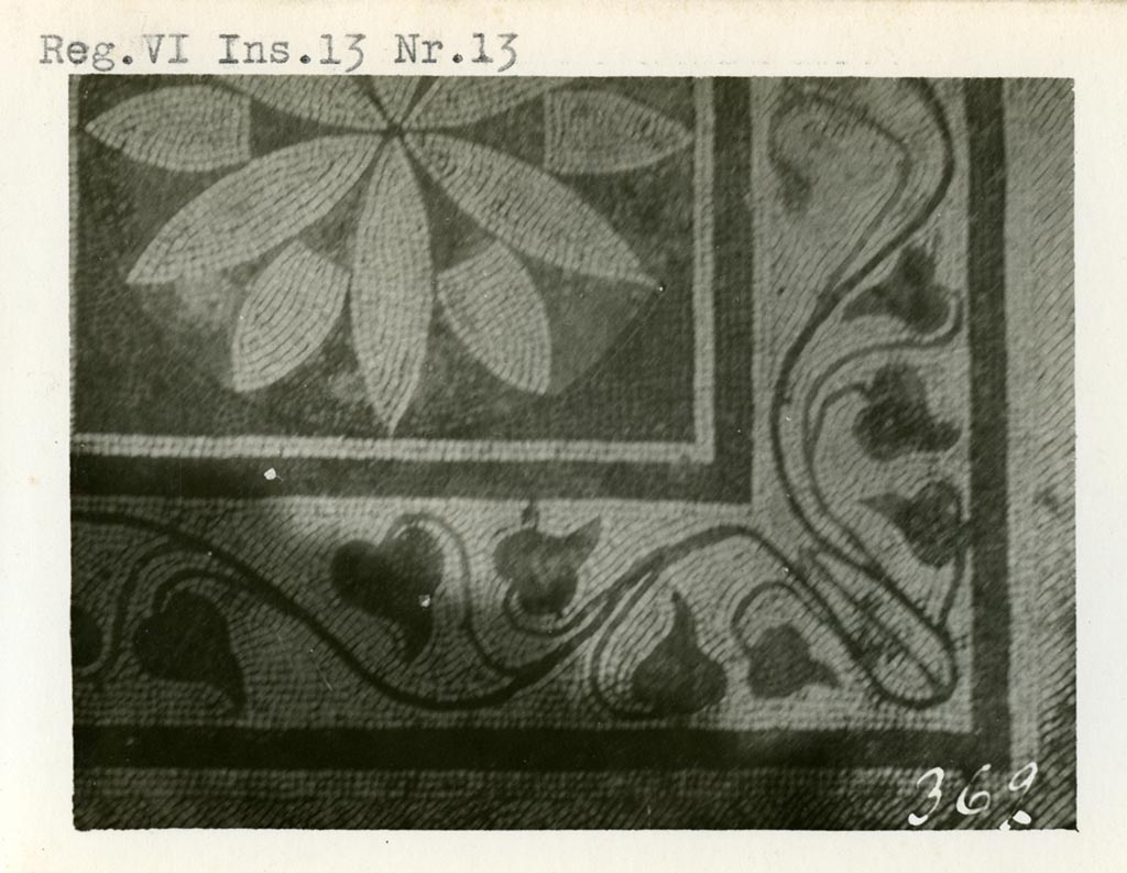 VI.13.13 Pompeii. Pre-1937-1939. Detail of floor mosaic in triclinium/oecus 
In the centre was an “emblema” with rose ornament set into a garland with red, green and yellow polychrome tesserae.
Photo courtesy of American Academy in Rome, Photographic Archive. Warsher collection no. 369.
