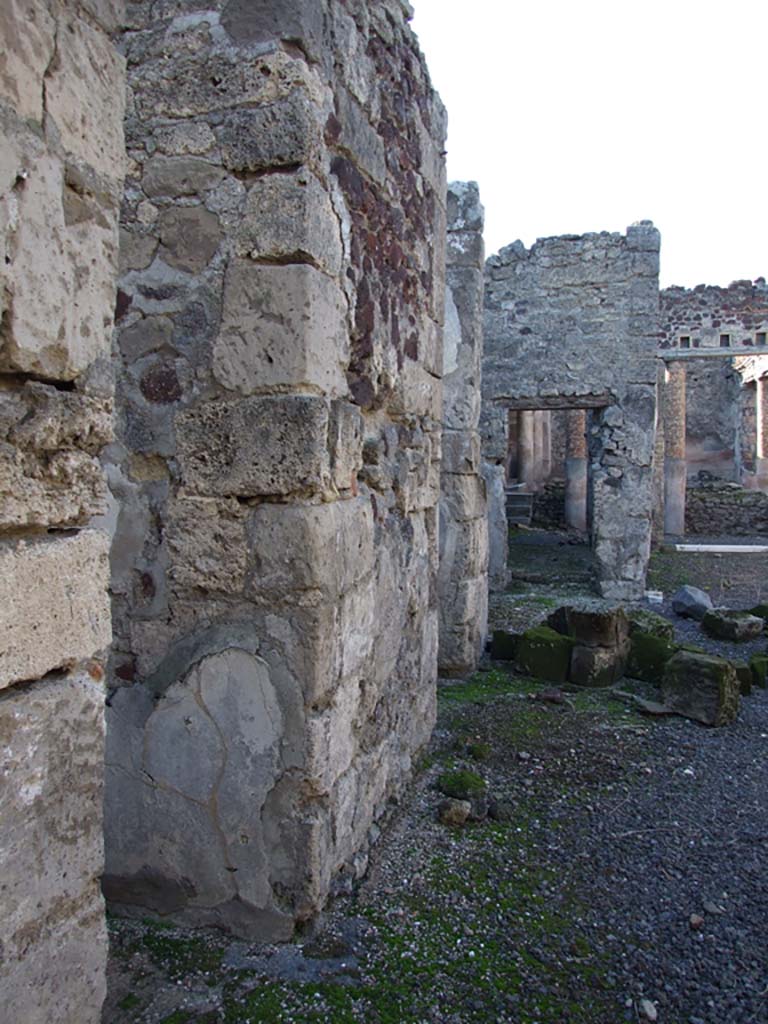 VI.14.22 Pompeii. December 2007. 
Room 1, looking west along south side of atrium, and doorways to rooms 2, 3 and 4.
