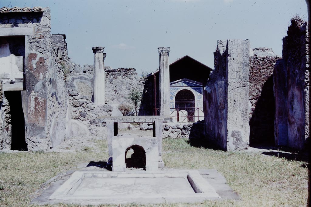 VI.14.43 Pompeii. 1968. 
Room 1, looking east across impluvium in atrium, towards tablinum, and garden area. Photo by Stanley A. Jashemski.
Source: The Wilhelmina and Stanley A. Jashemski archive in the University of Maryland Library, Special Collections (See collection page) and made available under the Creative Commons Attribution-Non-Commercial License v.4. See Licence and use details.
J68f1968
