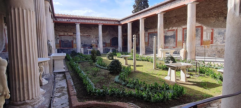 VI.15.1 Pompeii. April 2023. 
Looking south-west across peristyle garden from north-east corner. Photo courtesy of Giuseppe Ciaramella.
