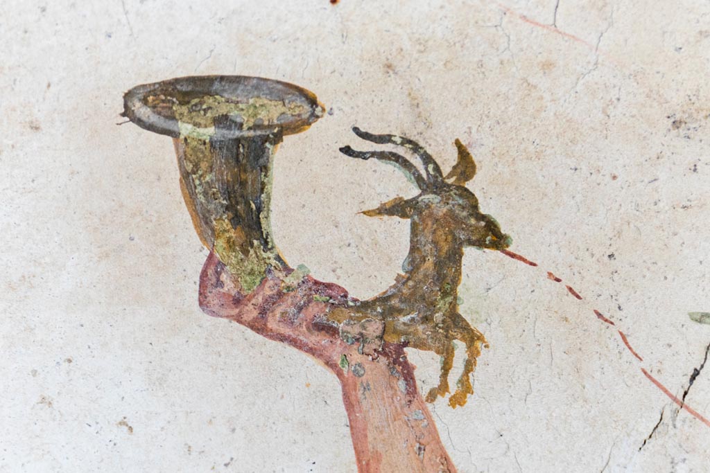 VI.15.1 Pompeii. August 2023. 
Detail from lararium painting of painted rhyton, from north end of lararium painting. Photo courtesy of Johannes Eber.
