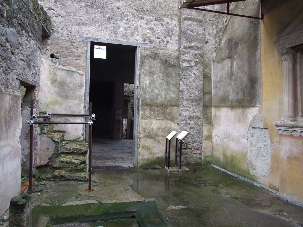 VI.15.1 Pompeii. December 2006. Looking south from service area towards doorway to atrium.