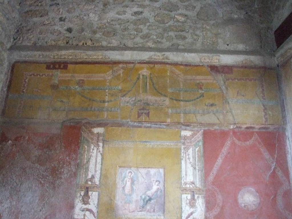 VI.16.15 Pompeii. December 2006. Upper west wall of room F with detail of wall decoration.
