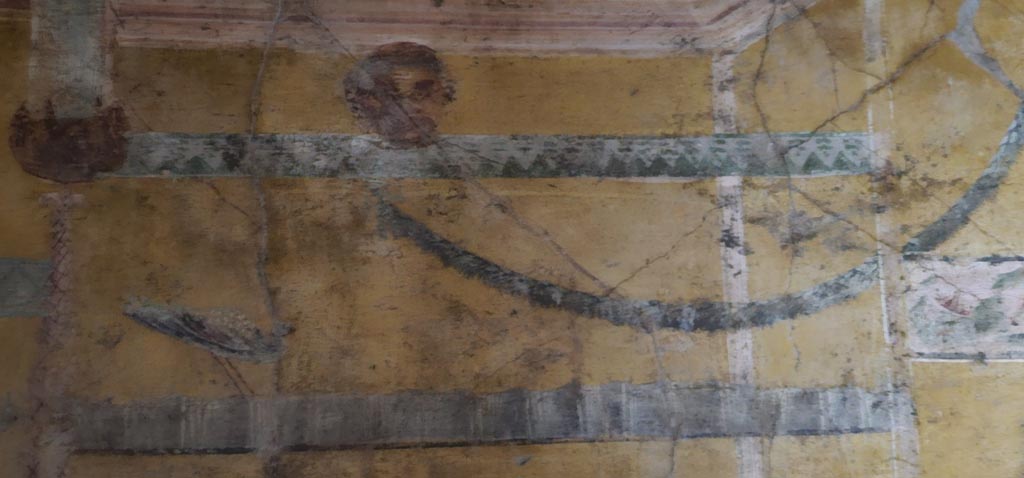 VI.16.15 Pompeii. December 2023. Detail from upper south end of west wall of room F. Photo courtesy of Miriam Colomer.