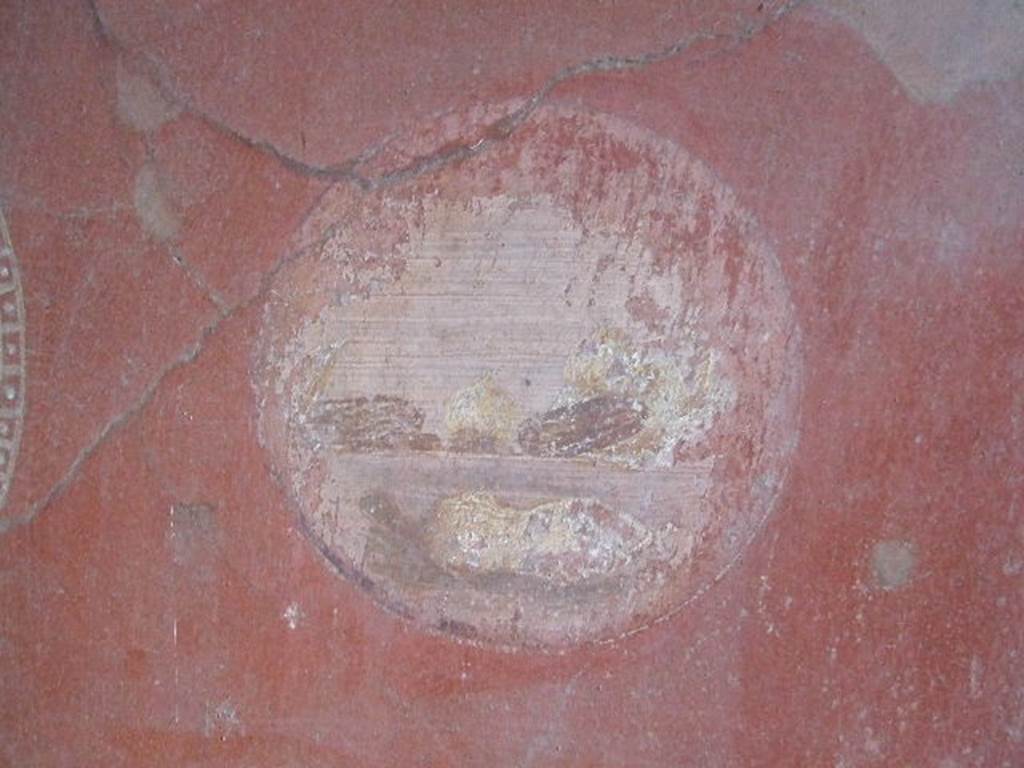 VI.16.15 Pompeii. December 2006. Medallion on north end of east wall of room F with painting of food.