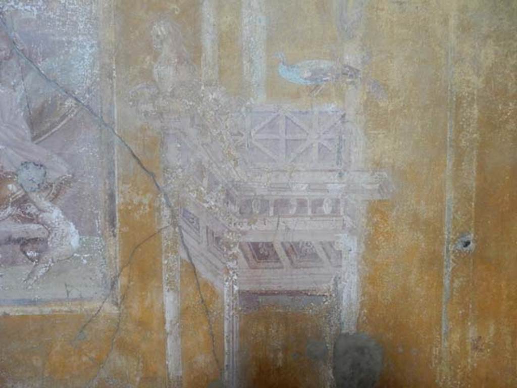 VI.16.15 Pompeii. May 2015. Room G, detail of wall decoration from east side of central painting on north wall. Photo courtesy of Buzz Ferebee.
