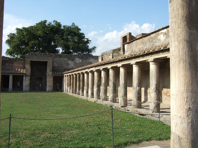 VII.1.8 Pompeii. 4th October 1937. Looking towards the entrance doorway and south-east corner of portico B. Photo courtesy of Rick Bauer.