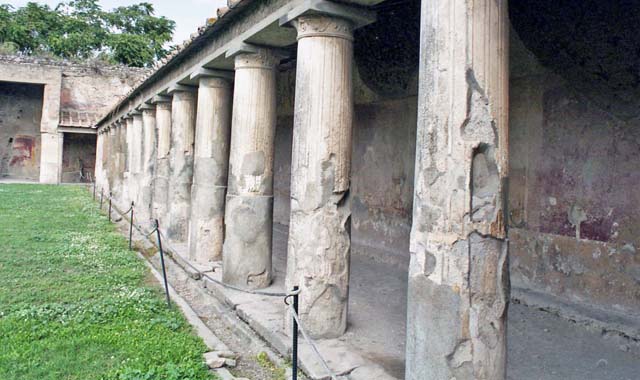 VII.1.8 Pompeii. June 2012. Corridor on east side of portico B, looking north. Photo courtesy of Michael Binns.