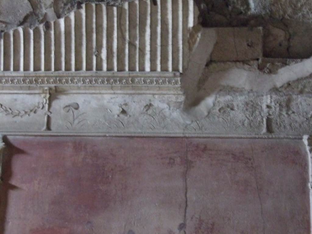 VII.1.8 Pompeii. December 2007. Stucco on north wall in caldarium 9 in womens baths.