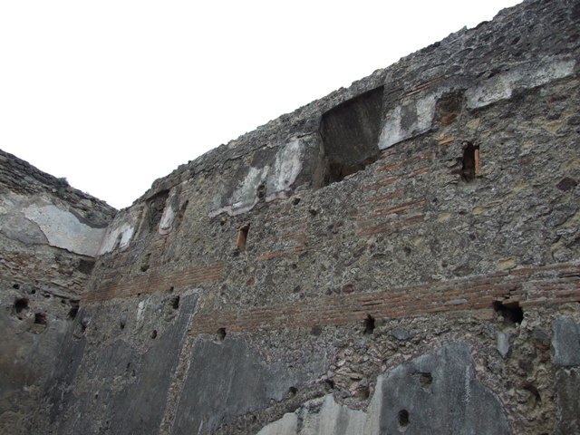 VII.1.8 Pompeii. December 2007. Room 8, women’s baths anteroom, east wall showing upper floor.