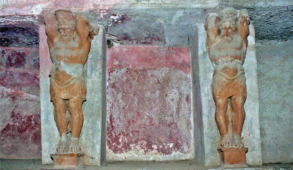 VII.5.24 Pompeii. October 2001. Detail of telamons on north wall in the tepidarium (37). Photo courtesy of Peter Woods.