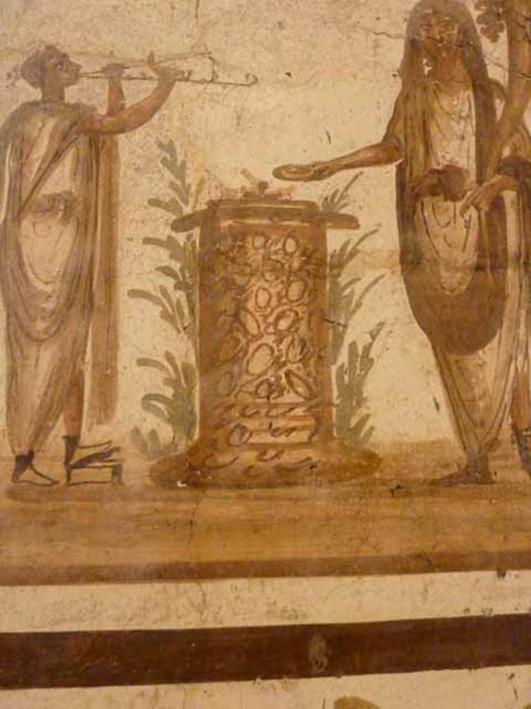 VII.6.38 Pompeii. Detail of round altar on lararium painting. Now in Naples Archaeological Museum. Inventory number: 8905.
