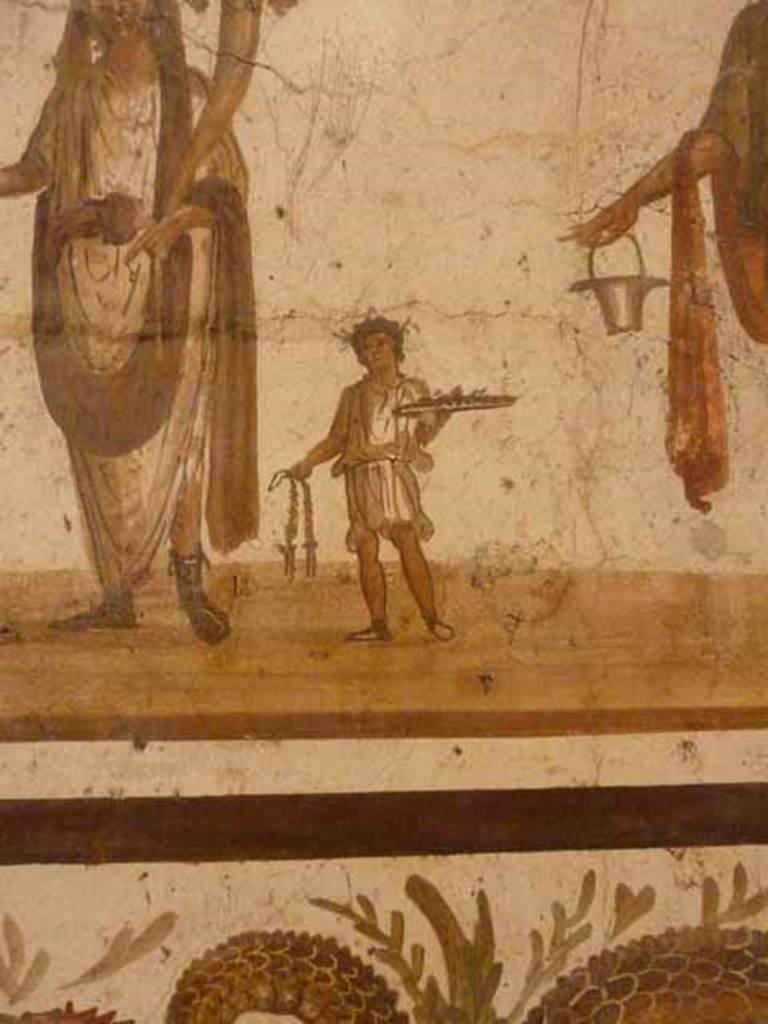 VII.6.38 Pompeii. Detail of priests assistant or camillus, shown on lararium painting. Now in Naples Archaeological Museum. Inventory number: 8905.
