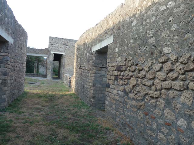 VII.7.2 Pompeii. September 2015. Looking north-east from entrance doorway towards doorway to room “c”.