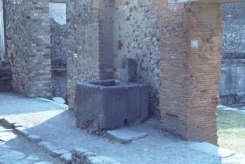 VII.7.26 Pompeii, on right, August 1976. Entrances to Forum on south side of Vicolo dei Soprastanti.
Photo courtesy of Rick Bauer, from Dr George Fay’s slides collection.

