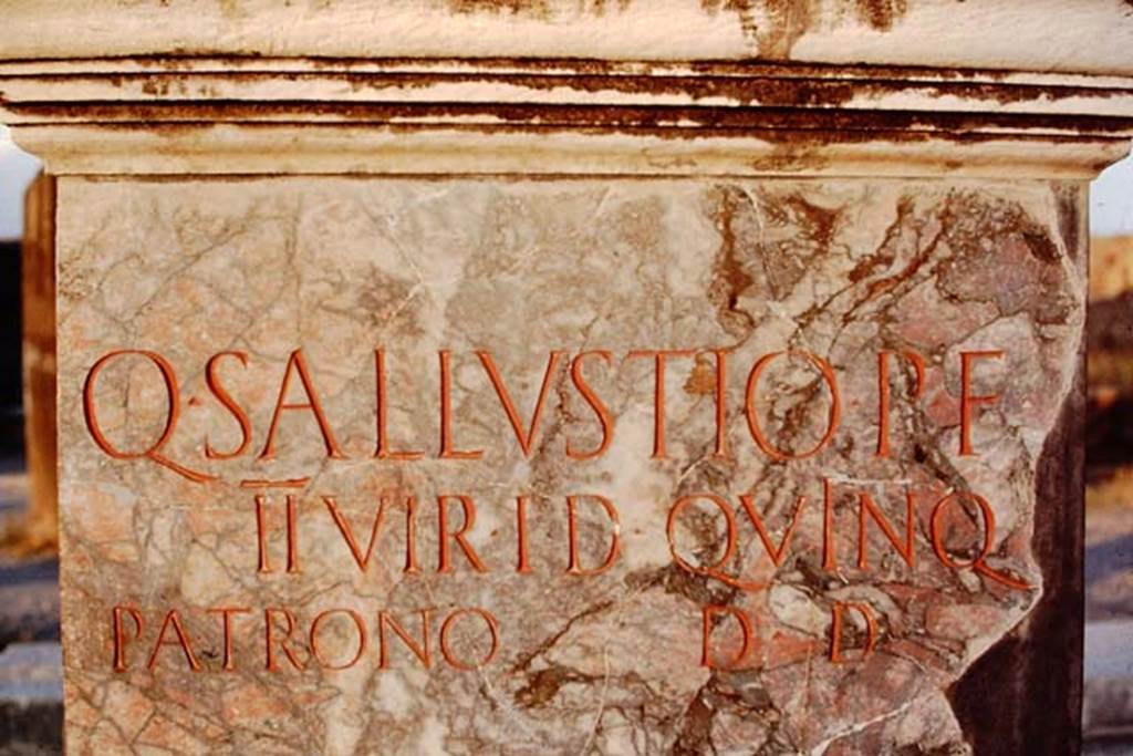 VII.8 Pompeii Forum. May 2010. West side of statue base in south-east corner, with inscription commemorating Quintus Sallustius. 