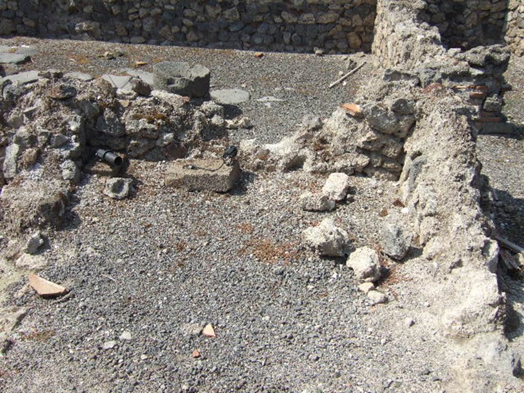 VII.16.8 Pompeii. September 2005. Site of steps to upper floor, in foreground. At the rear would be VII.16.6. On the right would be VII.16.9.
See Eschebach, L., 1993. Gebudeverzeichnis und Stadtplan der antiken Stadt Pompeji. Kln: Bhlau. (p. 347).



