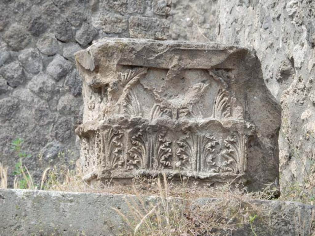 VIII.7.25 Pompeii. May 2017. Detail of east side of capital on podium, from entrance doorway. Photo courtesy of Buzz Ferebee.
