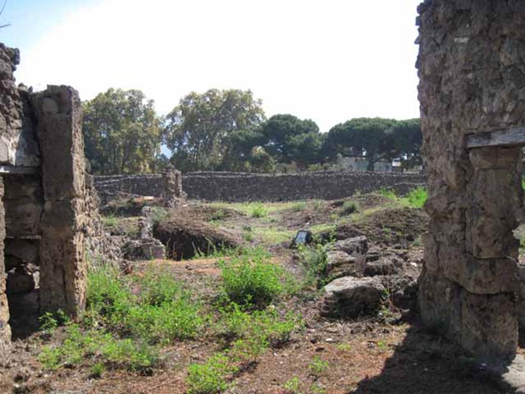 VIII.7.26 Pompeii. September 2010. Looking south from triclinium towards Odeon. Photo courtesy of Drew Baker. According to Jashemski, the triclinium (b) to the north had a good view of the garden. See Jashemski, W. F., 1993. The Gardens of Pompeii, Volume II: Appendices. New York: Caratzas. p.222)
