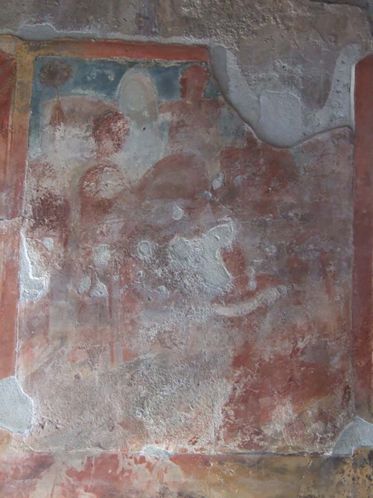 IX.3.5 Pompeii. March 2009. Room 14, centre panel of north wall.  
Remains of painting of Bacchus, winner of India erecting a trophaeon.
