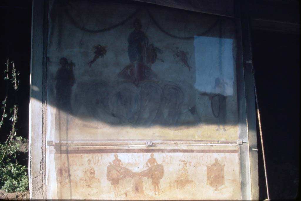 Between IX.7.7 and IX.7.6, Pompeii. 4th December 1971.
Lower part of painting of Venus, depicting felt workers (coactiliarii) producing cloth.
Photo courtesy of Rick Bauer, from Dr George Fays slides collection.

