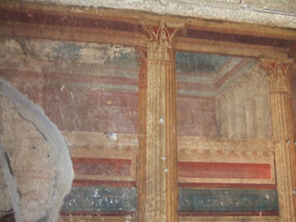 Villa of Mysteries, Pompeii. May 2006. Room 8, detail of architectural painting on west wall.